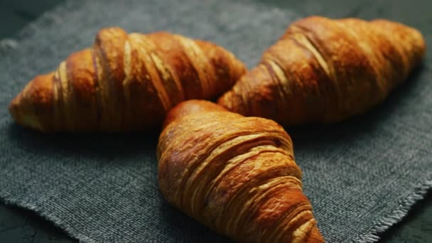 Fresh croissants placed on napkin - Footage, Video