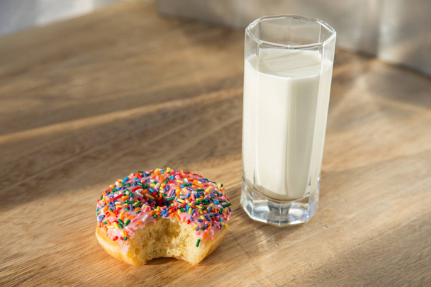 Delicious donuts with cup of milk - Foto, Bild