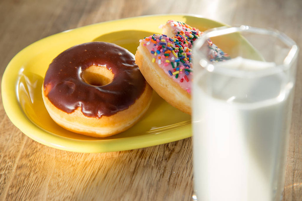 Delicious donuts with cup of milk - Foto, immagini