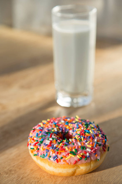 Delicious donuts with cup of milk - Фото, зображення