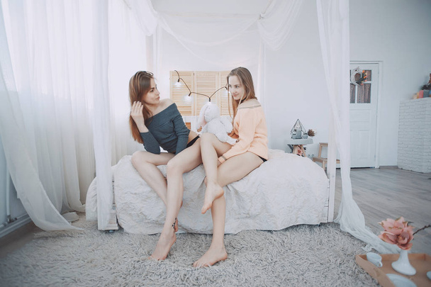 Girls in bed - Фото, зображення
