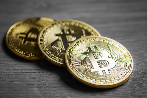 Golden bitcoins on wooden background - Foto, Imagen