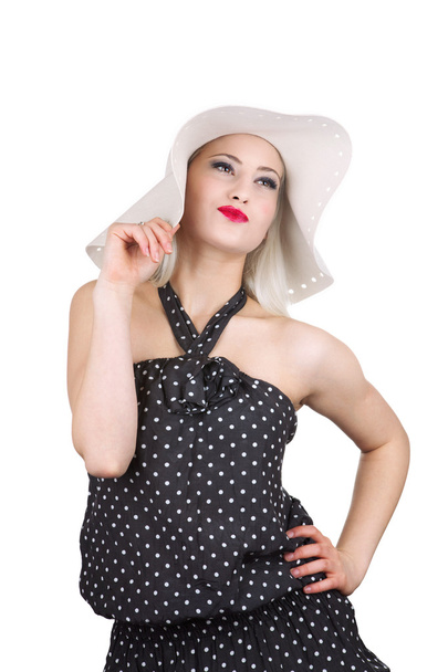 Attractive woman in hat and dotted dress, isolated on white - Фото, зображення