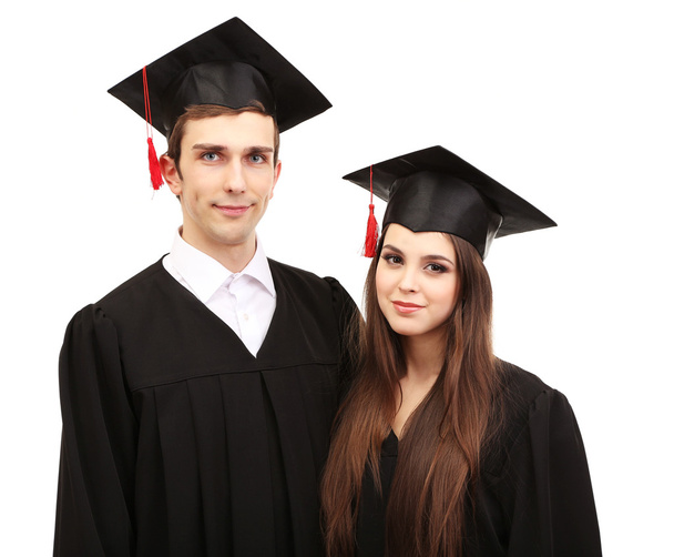 Two happy graduating students isolated on white - Fotó, kép