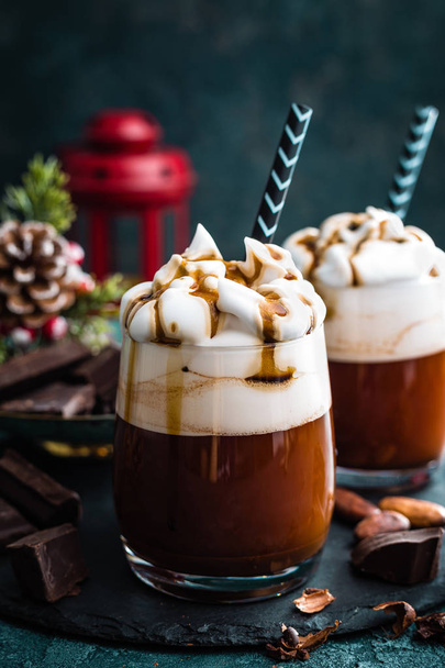 Hot chocolate with whipped cream. Chocolate drink and Christmas decorations - Fotoğraf, Görsel