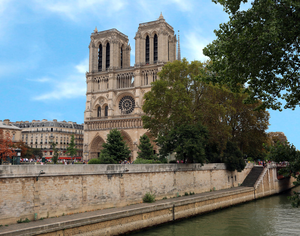 Basilica of Notre Dame in Paris France and the Seine River - Photo, Image