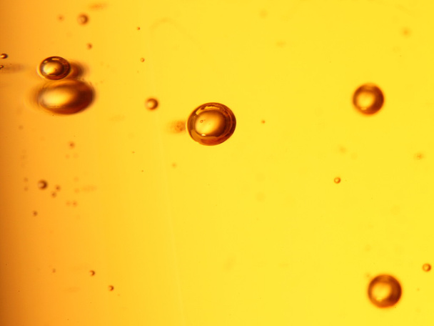 soap bubbles orange liquid - Fotó, kép