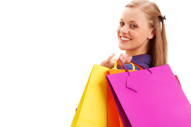 Woman holding shopping bags - Foto, Bild
