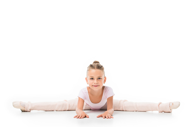 elegant little ballerina doing twine isolated on white background  - Foto, immagini