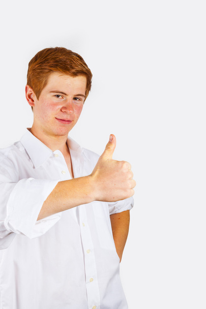boy showing i like it sign with thumbs up - Photo, Image