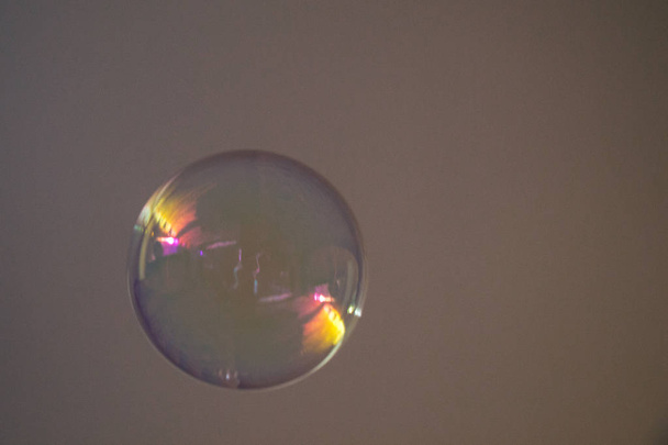 Blown single soap bubble in  the air - Foto, Imagen