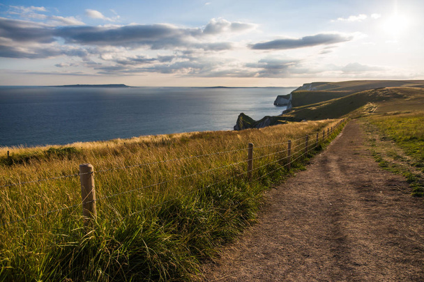 Lulworth Cove Coast Path and Rolling Cliffs at Sunset - Photo, Image