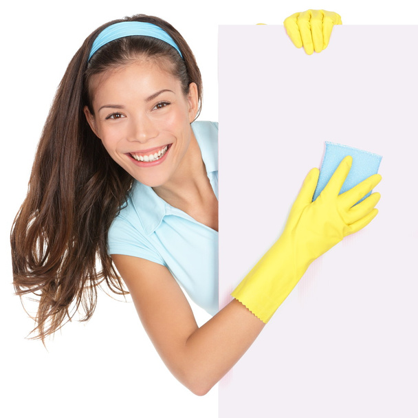 Mujer de limpieza mostrando signo
 - Foto, imagen