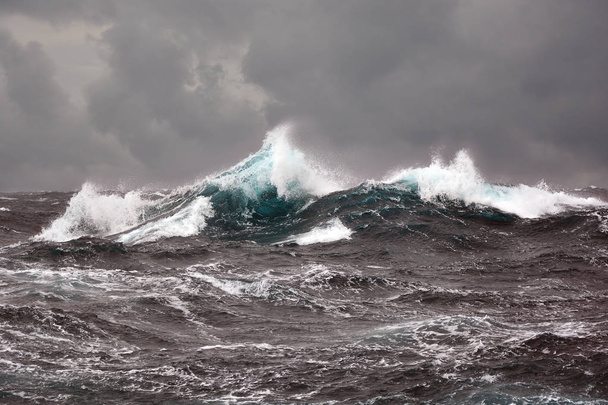 sea wave and dark clouds in atlantic ocen during storm - Photo, Image
