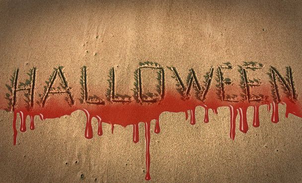 the inscription Halloween on the  sand with blood - Foto, Imagen