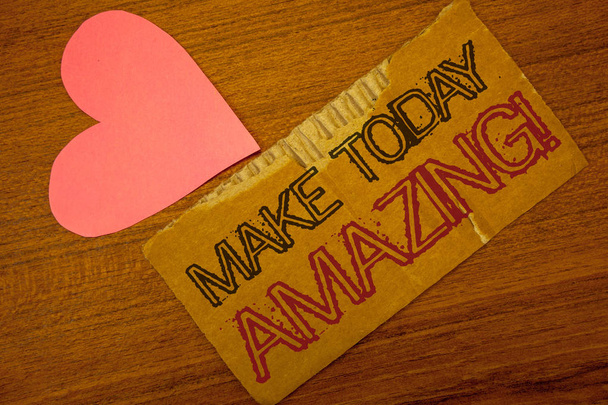 Text sign showing Make Today Amazing Motivational Call. Conceptual photo Productive Moment Special Optimistic Peru color torn page with engraved black red text woody desk pink heart. - Photo, Image
