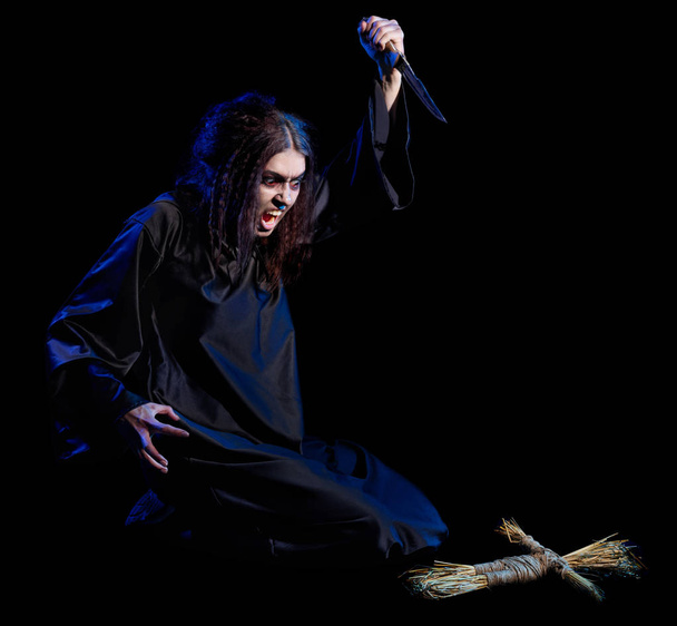Scary witch isolated on black - Φωτογραφία, εικόνα