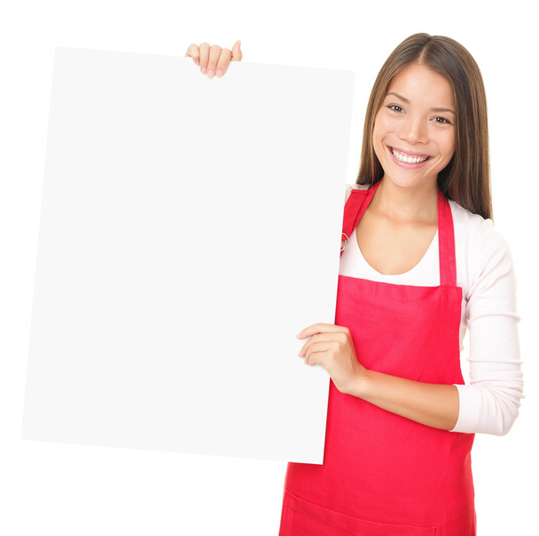 Sales clerk showing blank sign - Photo, Image