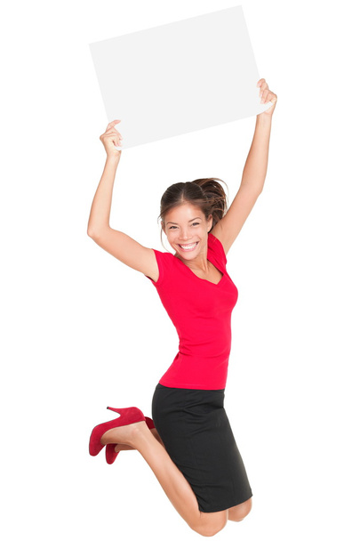 Jumping innoissaan nainen osoittaa merkki
 - Valokuva, kuva