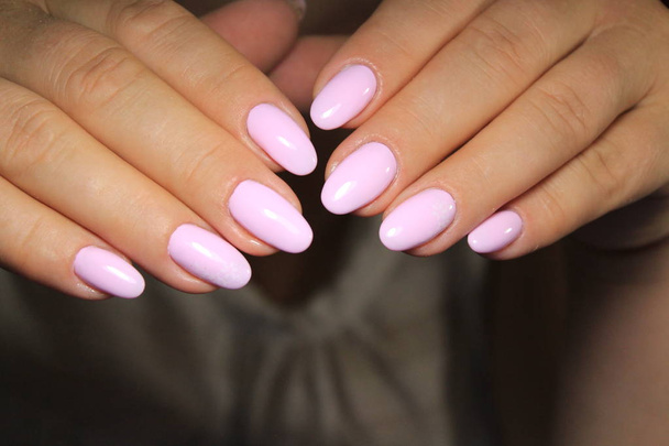 Sexual pink manicure on beautiful female hands - Photo, Image