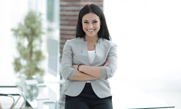 modern business woman on a blurred background. - Фото, зображення