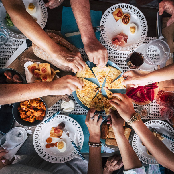 Top view of people hands taking food, dinner together - Photo, Image