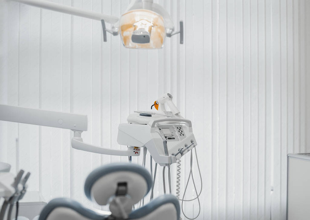 Dental equipment and dental instruments in bright modern dental clinic. - Foto, Imagen