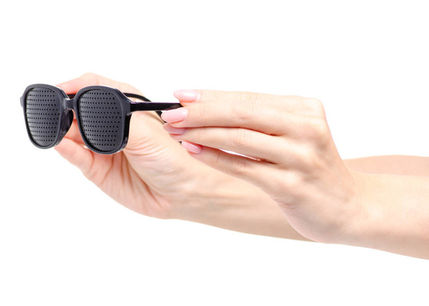 Perforated glasses medical in hand - Photo, Image