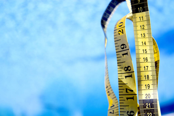 Measuring tape on pool background. No people - Photo, Image