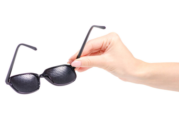 Perforated glasses medical in hand - Zdjęcie, obraz