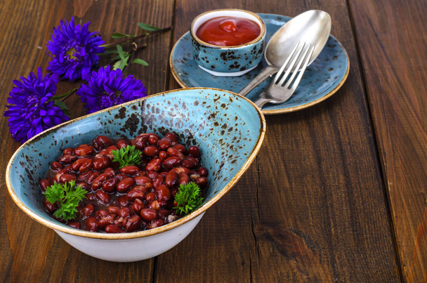 Canned beans in tomato sauce - Foto, afbeelding
