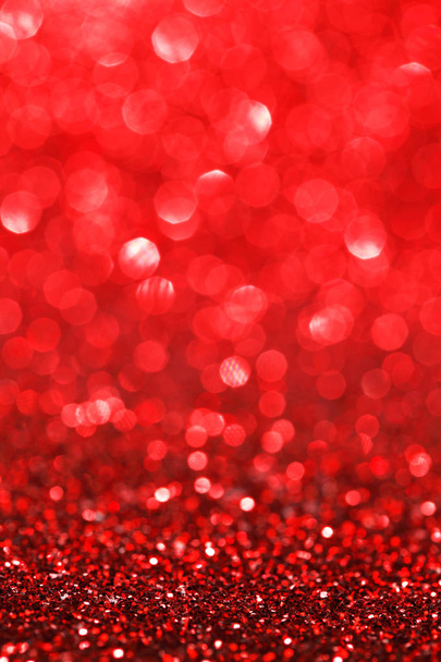 Red bokeh holiday textured glitter background - Φωτογραφία, εικόνα