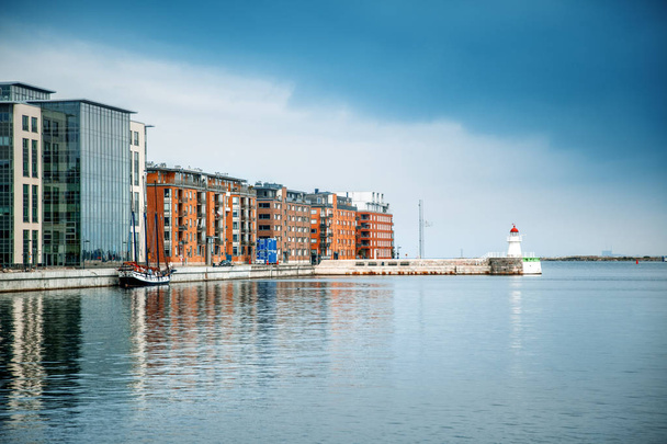Cityscape of harbour and lighthouse in Malmo, Sweden, modern city urban landscape - Fotoğraf, Görsel