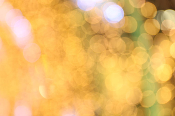 Bokeh Hintergrund gold gelb bunt frohe Weihnachten, frohes neues Jahr Bokeh Beleuchtung leuchten auf Nachthintergrund, Bokeh Glitzerlicht, goldene Luxus-Hintergrund Textur, glitzernde Tapete - Foto, Bild