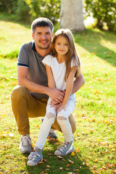 Portrait of a young father with his daughter - Foto, Imagem