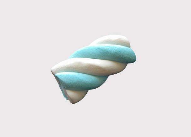 A marshmallow candy isolated on the light grey background - Photo, Image