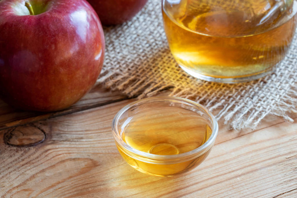 A bowl of apple cider vinegar - Photo, Image