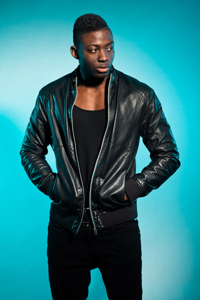 Cool urban stylish black american man. Fashion studio shot. - Foto, Bild