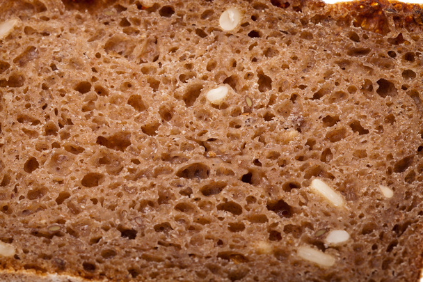 Rebanada de pan oscuro
 - Foto, imagen