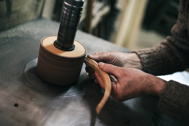 Close up shot of old master carpenter working in his woodwork or workshop - Φωτογραφία, εικόνα
