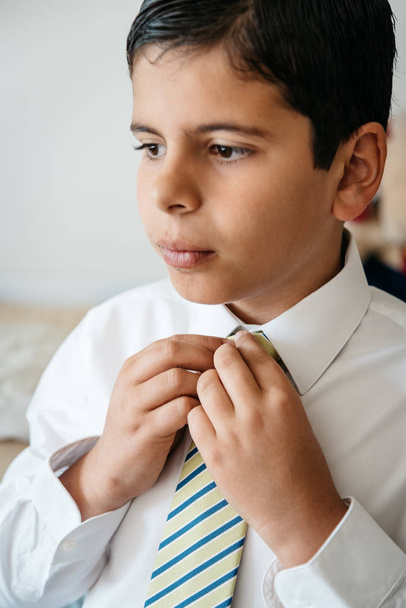 A Young boy getting ready for celebration - Foto, Imagen