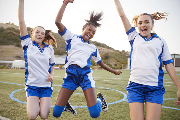 Celebrating Female High School Students Playing In Soccer Team - Фото, зображення