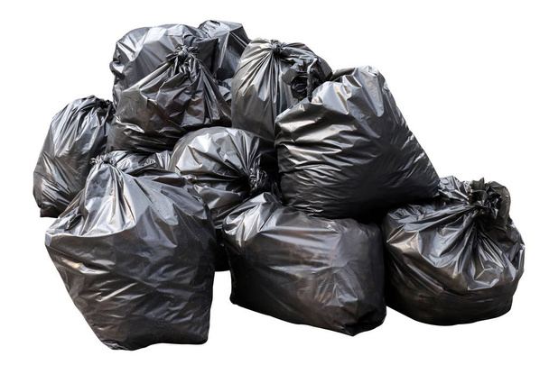 waste, black garbage bags plastic pile stack isolated on white background, lots pile of garbage black bags stack - Photo, Image