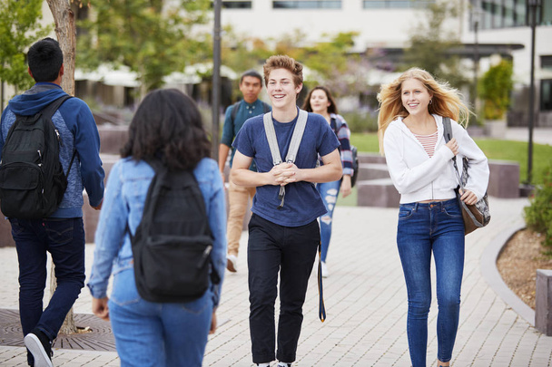 High School Students Socializing Outside College Buildings - Photo, image