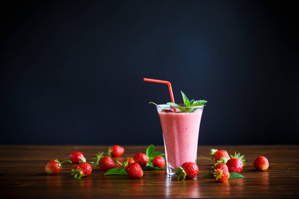 strawberry fresh sweet smoothies in a glass on the table - Foto, Imagen