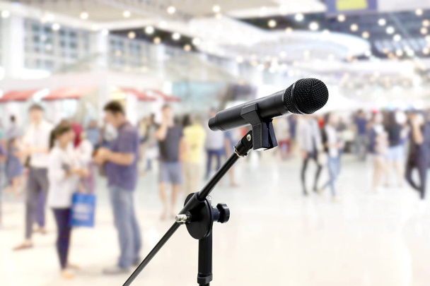 Microphone public relations on Blurred many People within Department store Shopping Mall Event hall inside background - Photo, Image