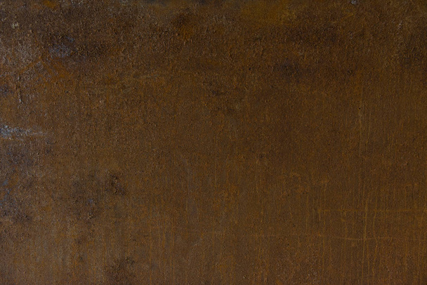 Rusty metal surface with low light. Spotty texture.  - Photo, Image
