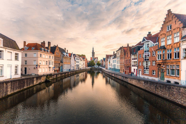 Brugge cityscape. Bruges skyline. Historic street and water channel in Brugge. Belgium. - Fotó, kép