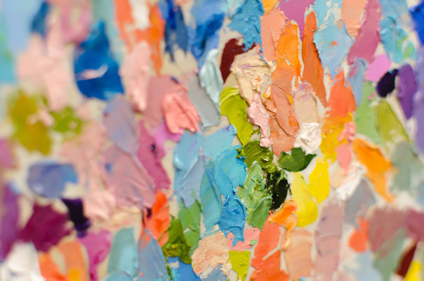 Abstract art background. Multicolored bright texture. Contemporary art. Oil painting on canvas. Fragment of artwork. Spots of oil paint. Brushstrokes of paint. Modern art. - Valokuva, kuva