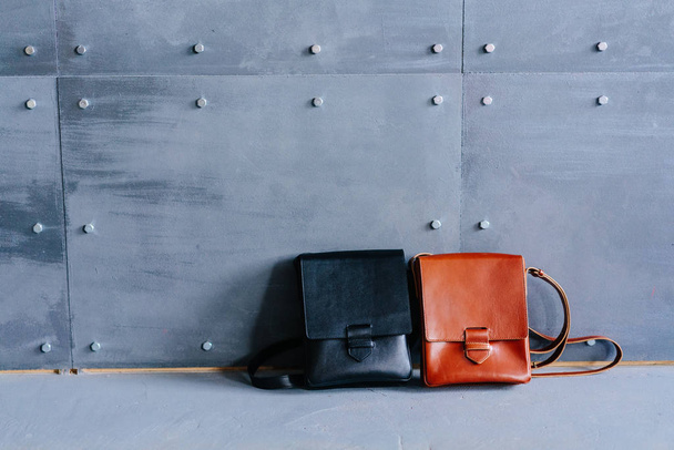 two leather bags on a gray background - Photo, Image